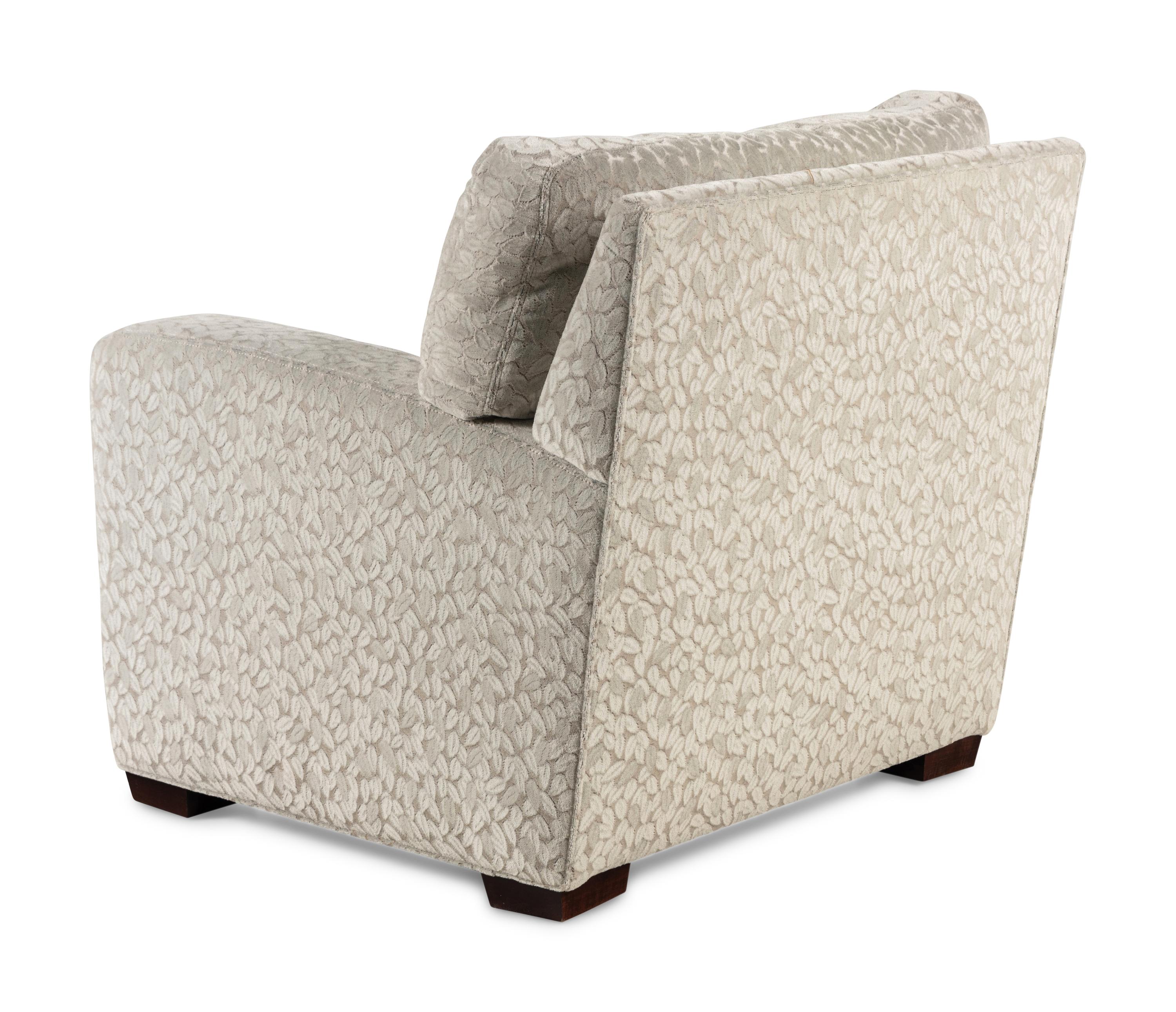A Brunschwig & Fils Armchair and Ottoman