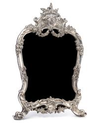 A Russian Silver Table Mirror, Mark of Faberge, St. Petersburg, 20th century, having a floral crest above an applied double-headed eagl