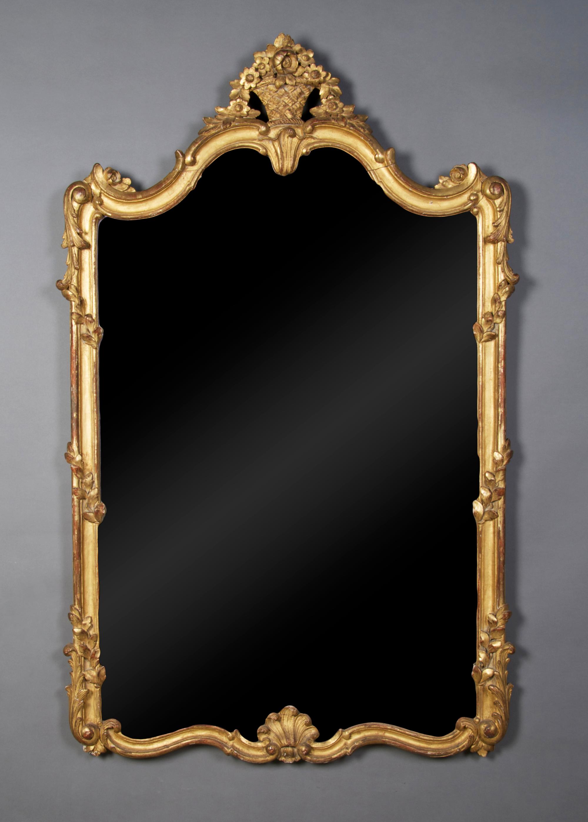 A French Giltwood Mirror, Height 48 1/2 x width 30 inches.