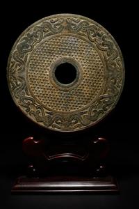 A Chinese Liangzhu-s tyle Carved Nephrite Jade Bi Disc