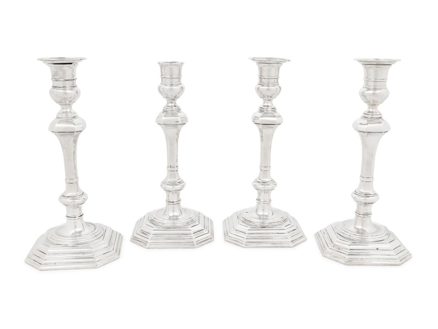 A Set of Four English Silver Candlesticks