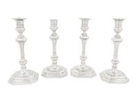A Set of Four English Silver Candlesticks
