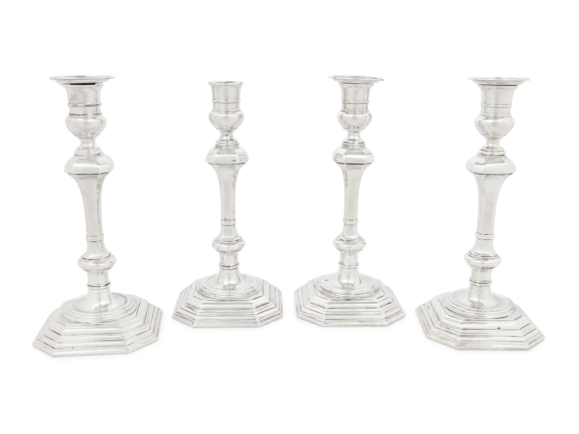 A Set of Four English Silver Candlesticks