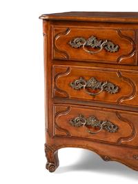 A Louis XV Provincial Walnut Commode