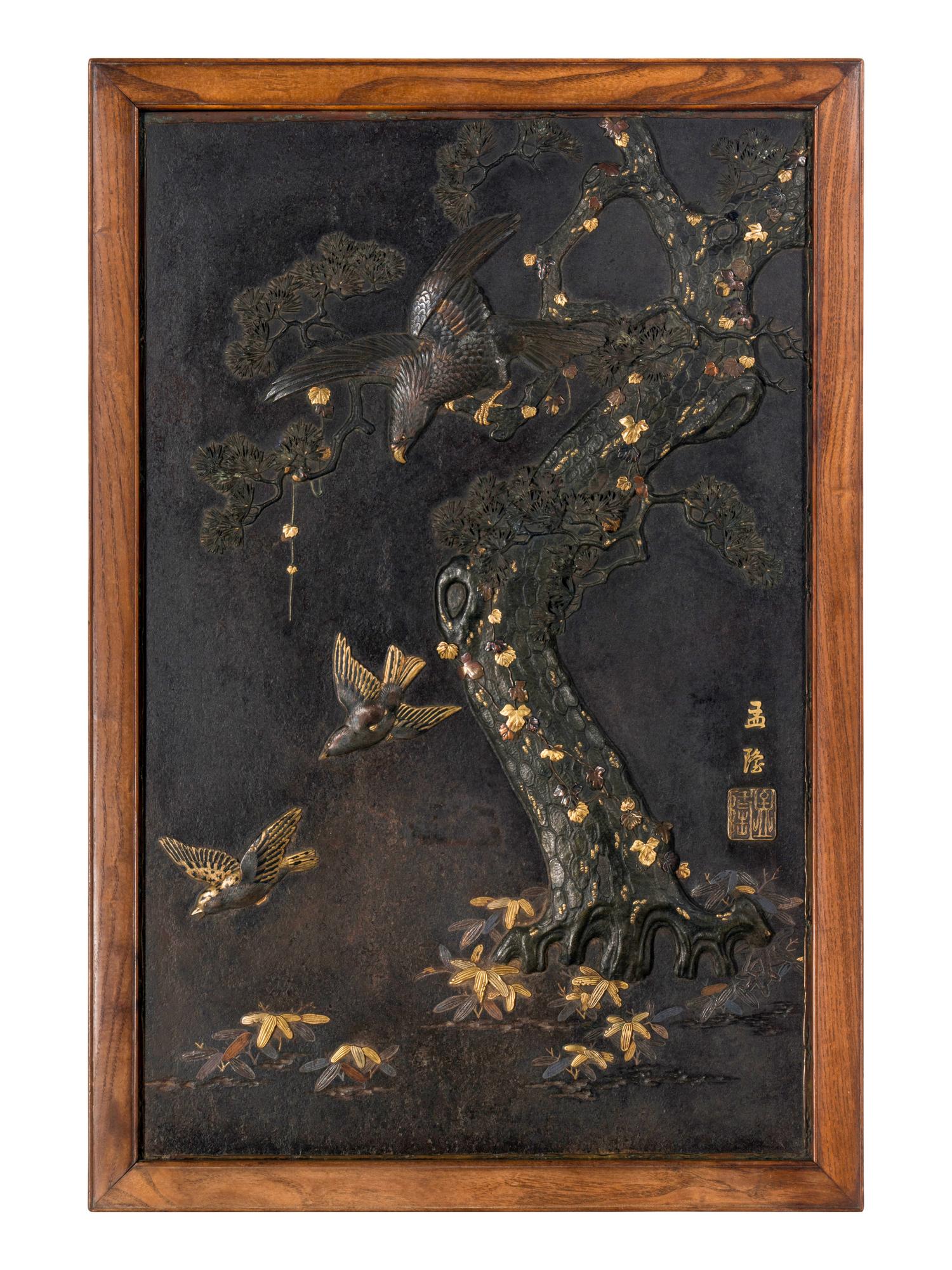 A Japanese Parcel Gilt and Mixed-Metal Inlaid Iron 'Eagle and Pine' Plaque, Meiji Period 日本明治時期 鐵花鳥挂屏