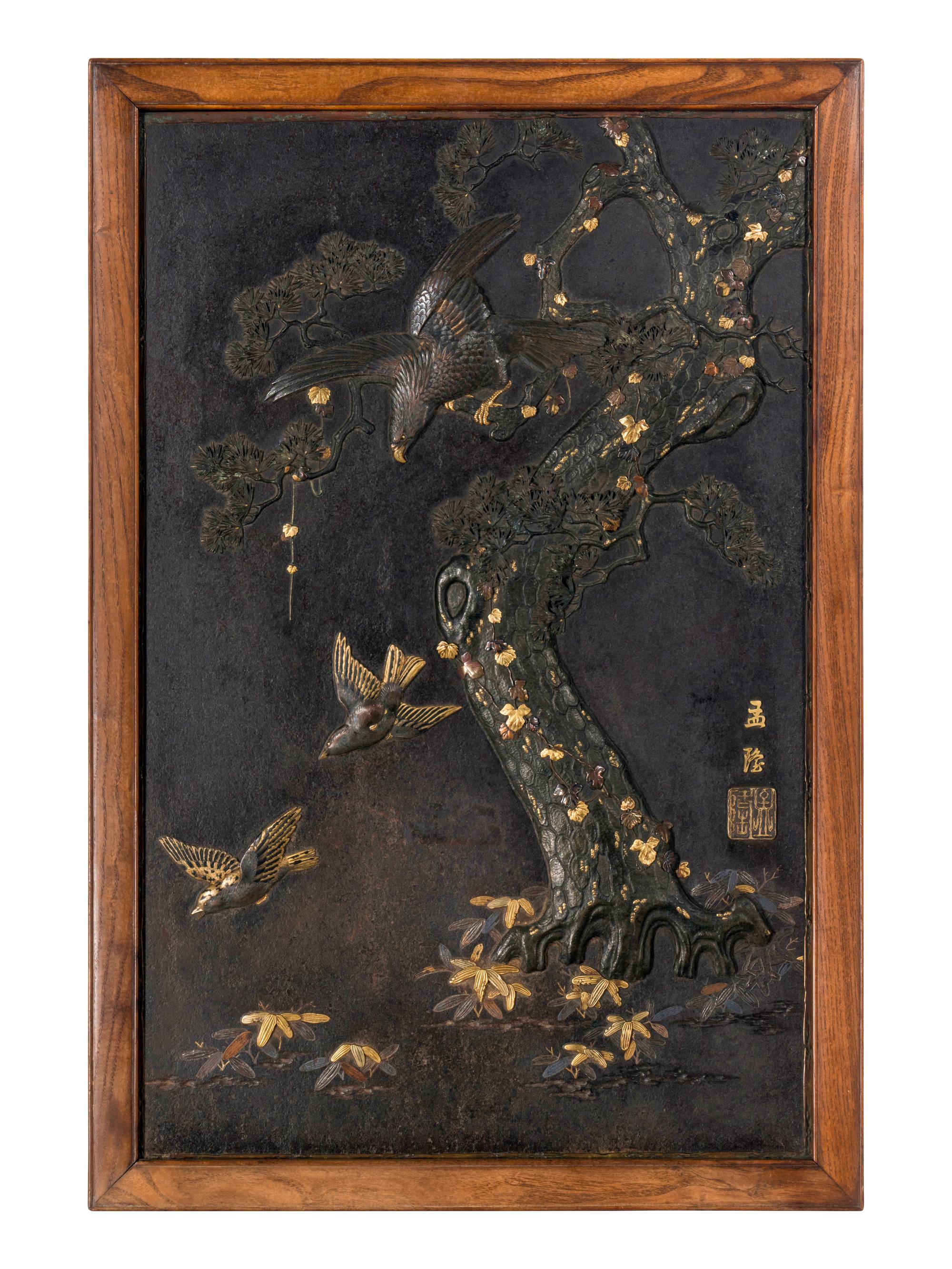 A Japanese Parcel Gilt and Mixed-Metal Inlaid Iron 'Eagle and Pine' Plaque, Meiji Period 日本明治時期 鐵花鳥挂屏