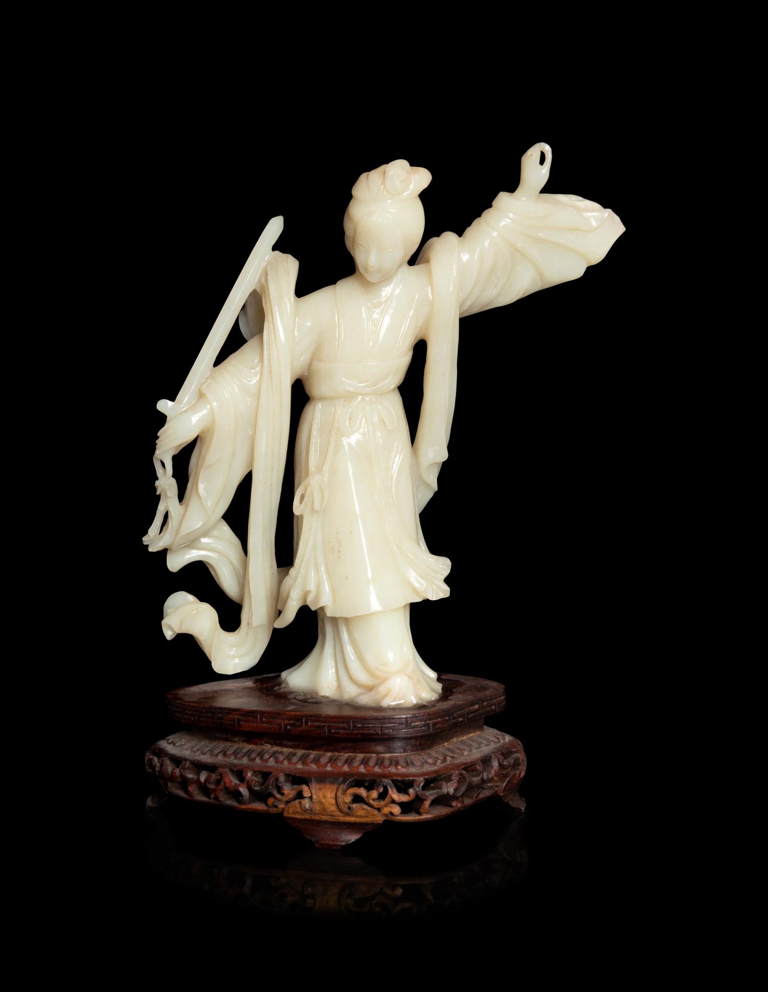 A Chinese Jade Figure of a Female Immortal