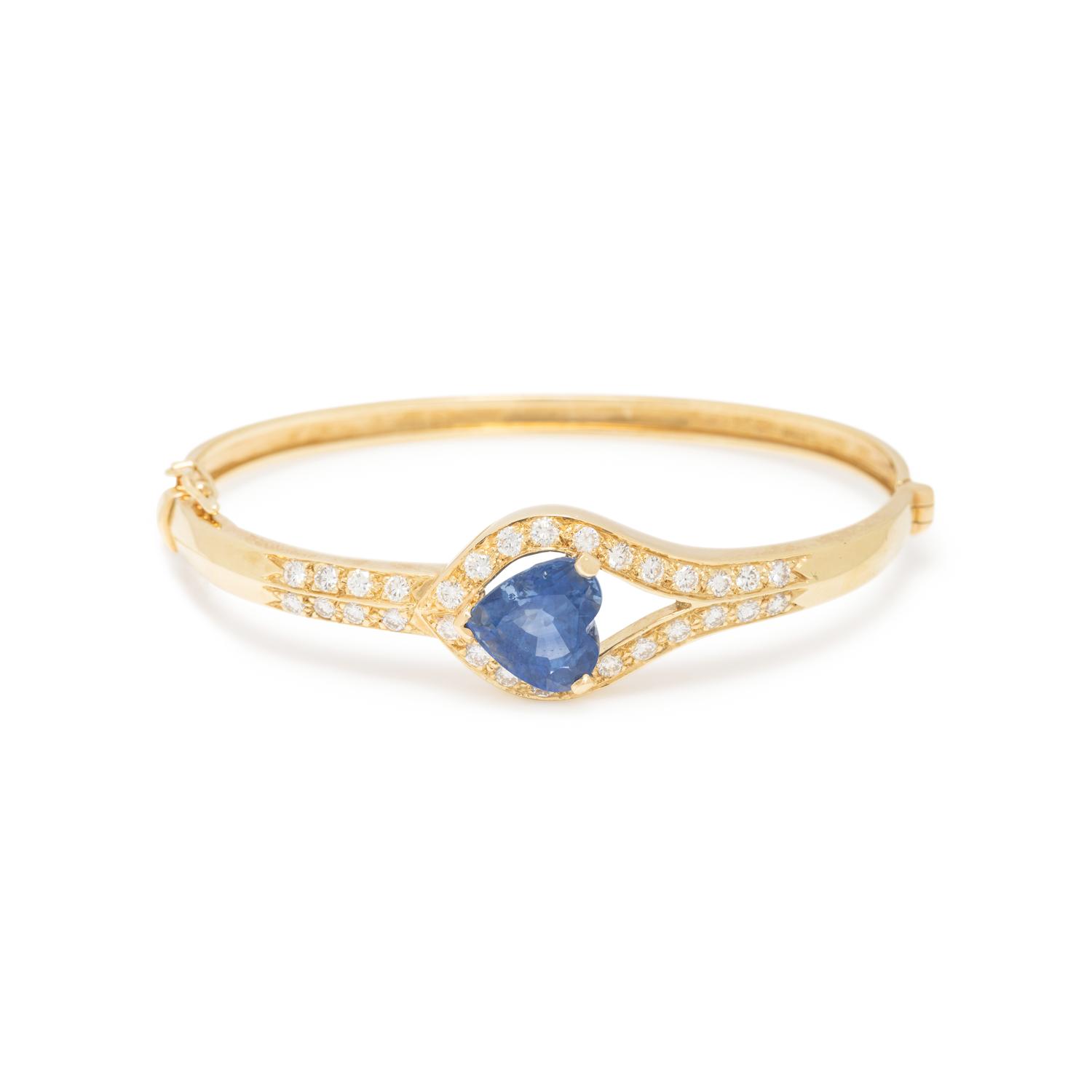 BOODLE & DUNTHORNE, YELLOW GOLD, SAPPHIRE, AND DIAMOND BANGLE BRACELET