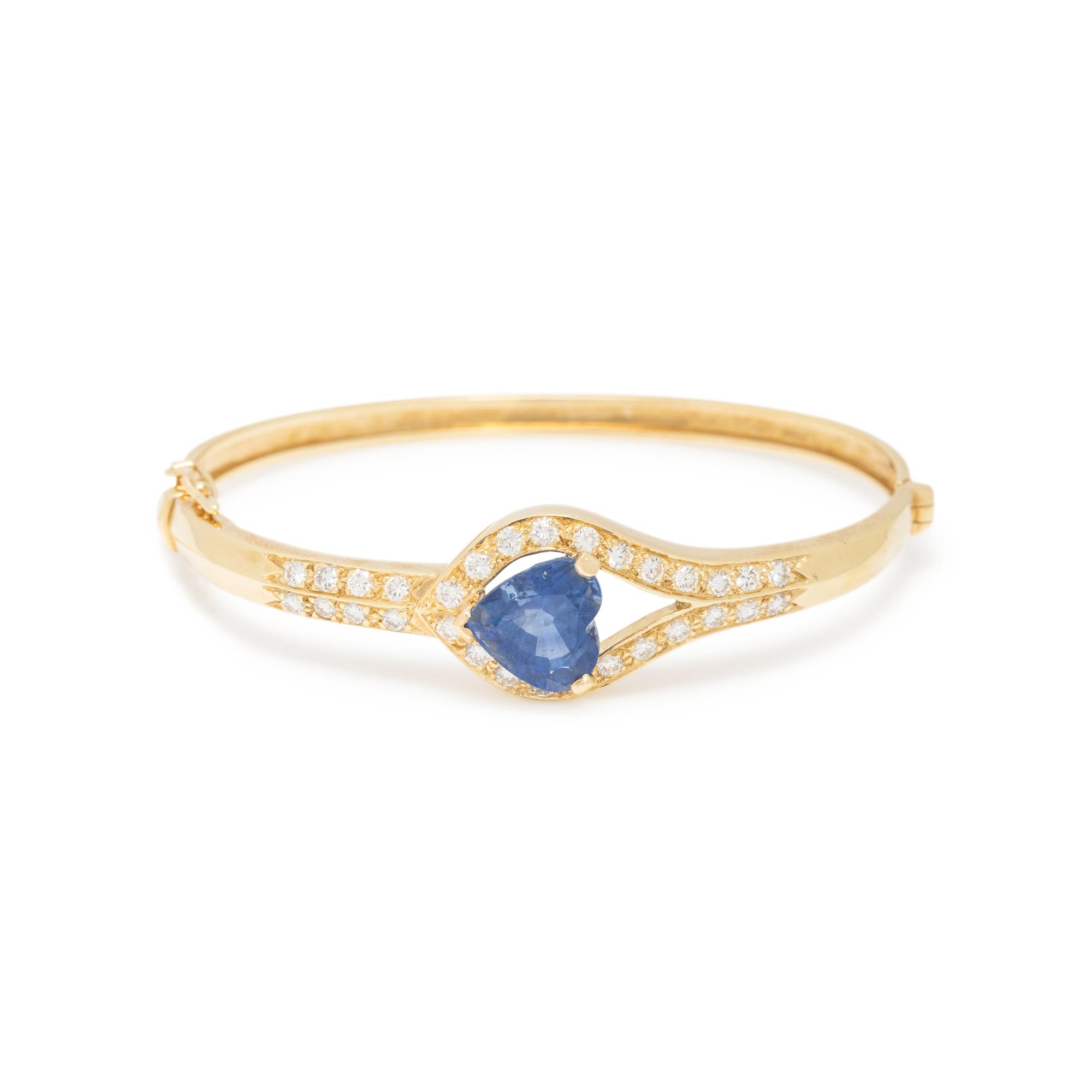 BOODLE & DUNTHORNE, YELLOW GOLD, SAPPHIRE, AND DIAMOND BANGLE BRACELET