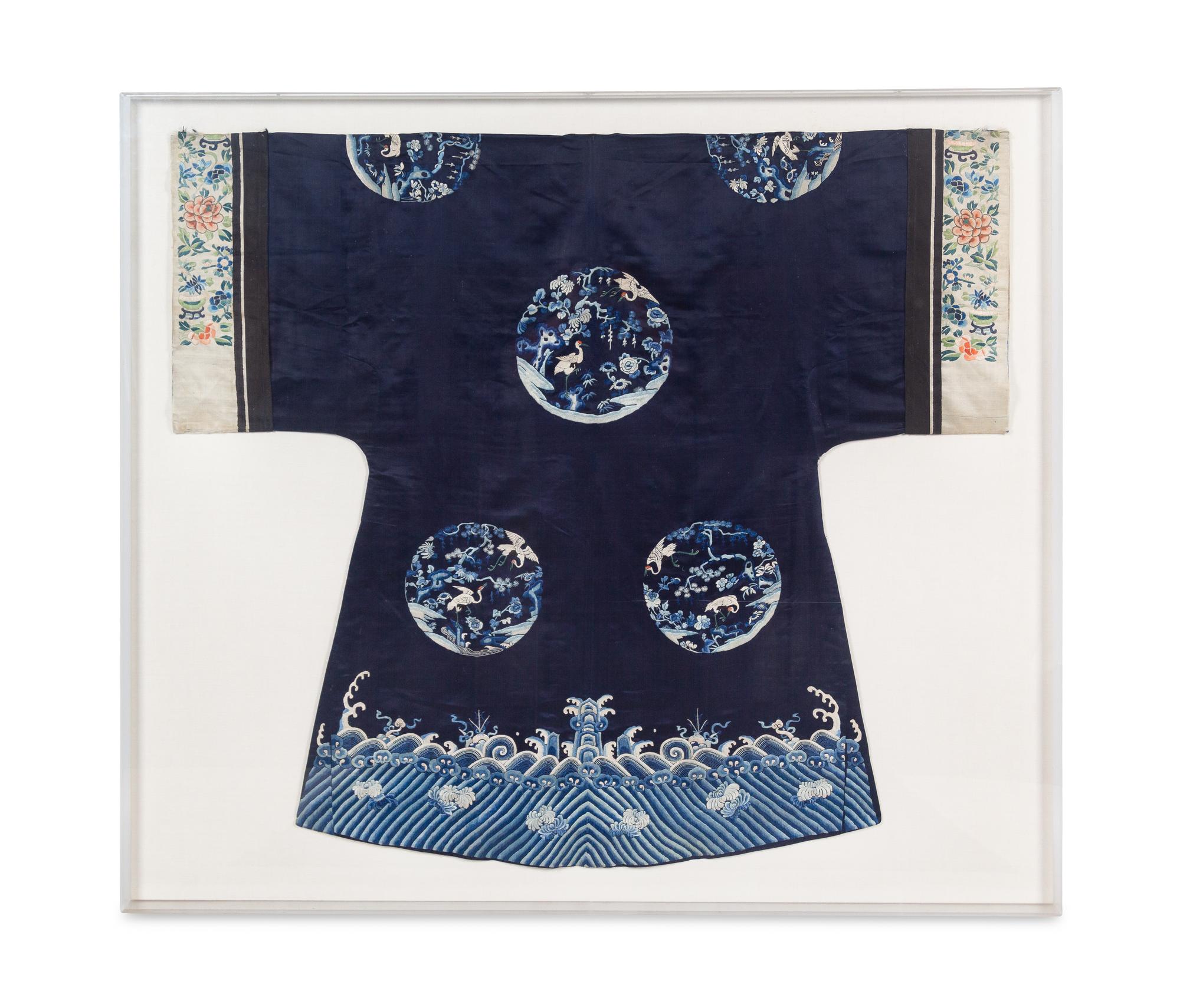 A Chinese Dark Blue Ground Embroidered Silk Lady's Robe
