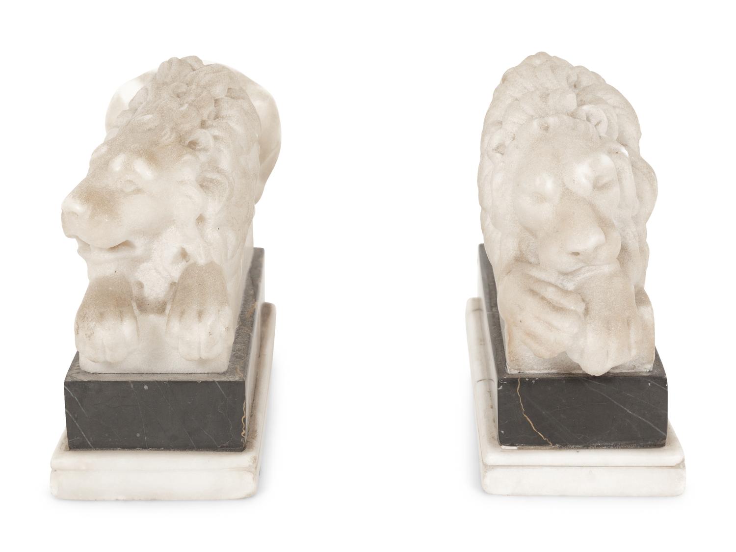 A Pair of Marble Recumbent Lion Bookends