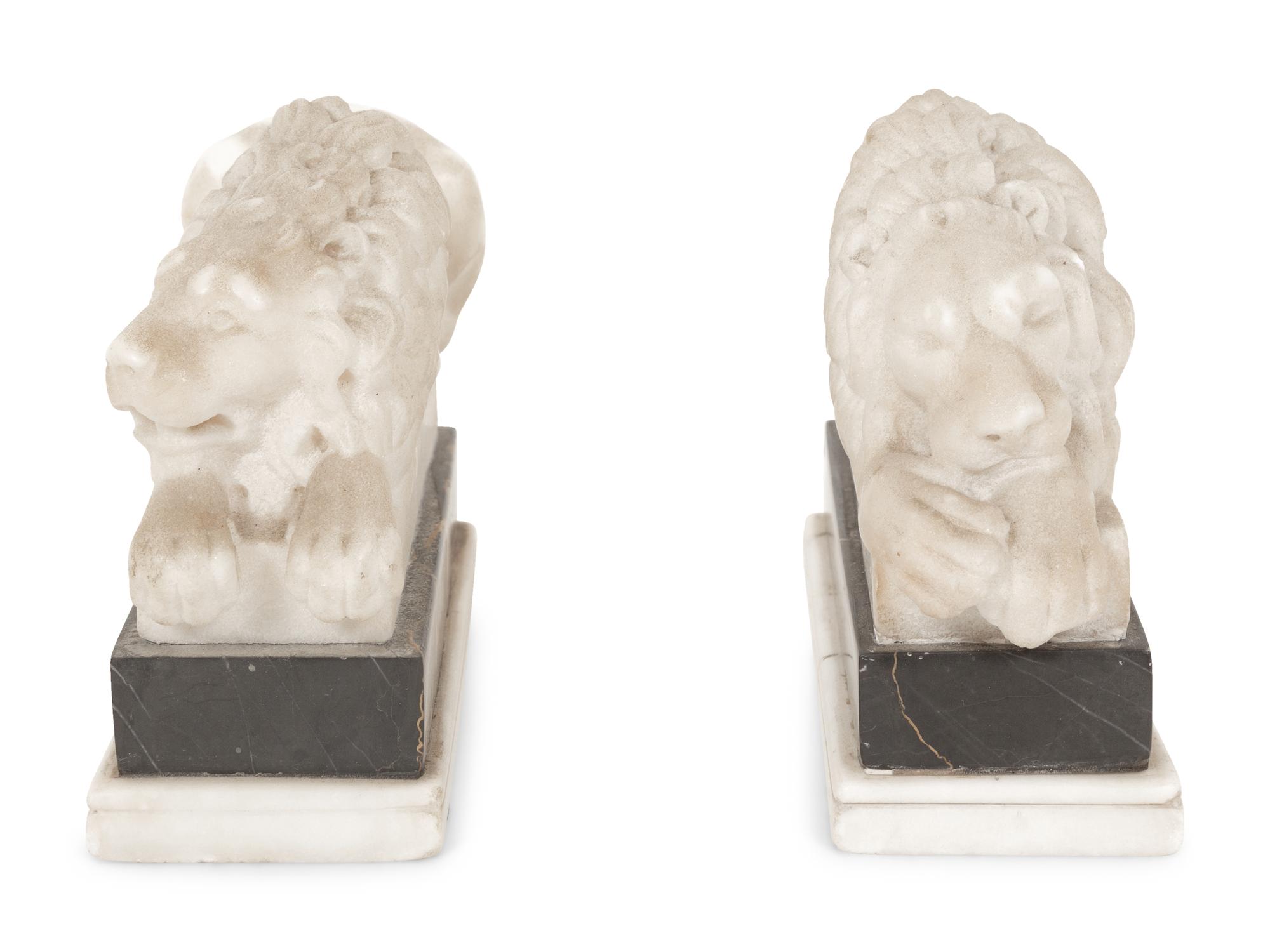 A Pair of Marble Recumbent Lion Bookends
