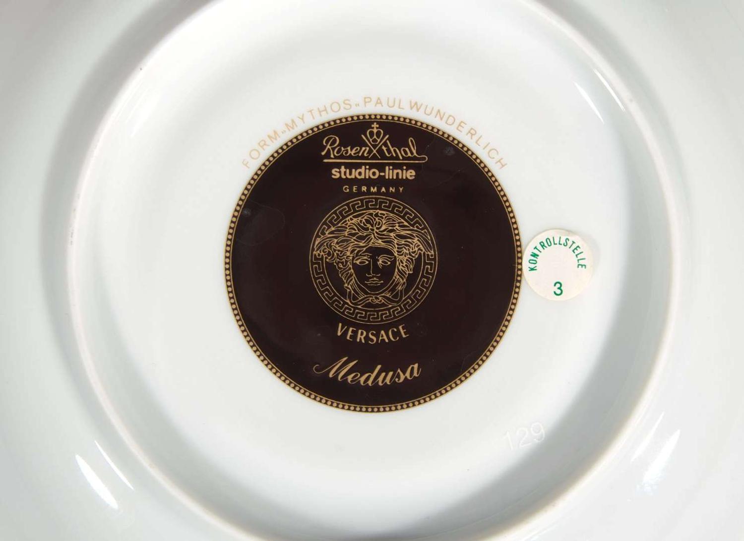 A Versace enameled porcelain part dinner service in the "Medusa" pattern, produced by Rosenthal Studio Line, Germany, modern