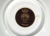 A Versace enameled porcelain part dinner service in the "Medusa" pattern, produced by Rosenthal Studio Line, Germany, modern