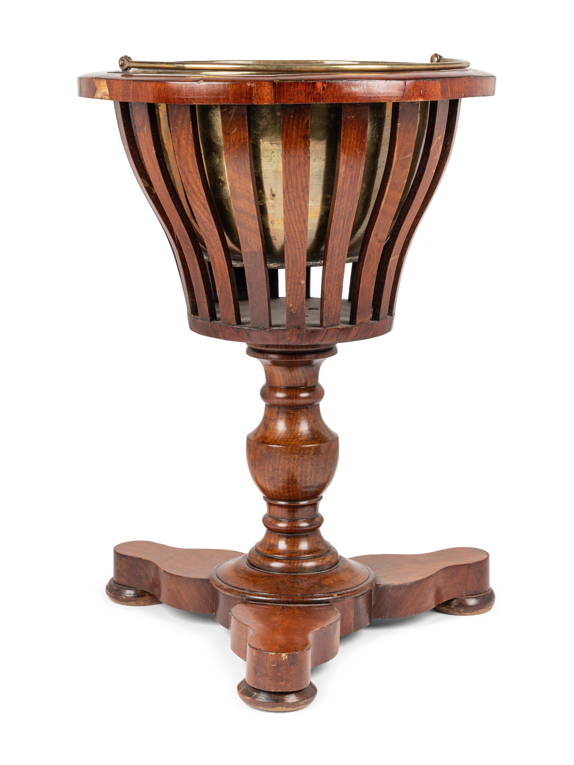 A Regency Style Mahogany Jardinière with Brass Liner