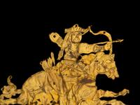 A Gold 'Equestrian' Ornament
