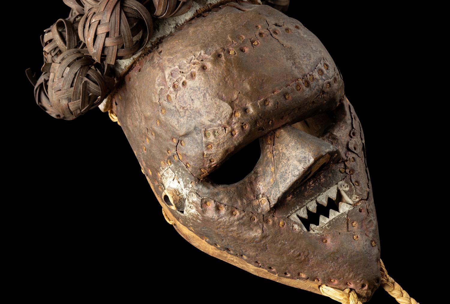 A Salampasu Wood and Copper Headhunter Mask
