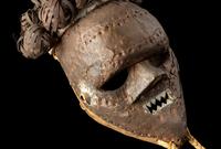 A Salampasu Wood and Copper Headhunter Mask