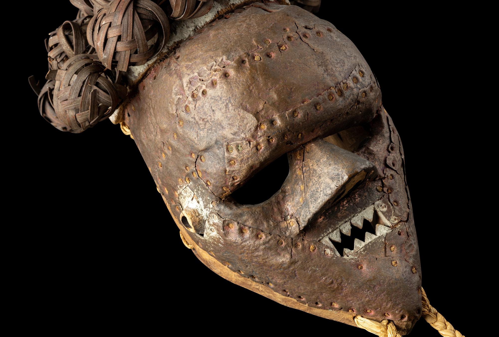 A Salampasu Wood and Copper Headhunter Mask