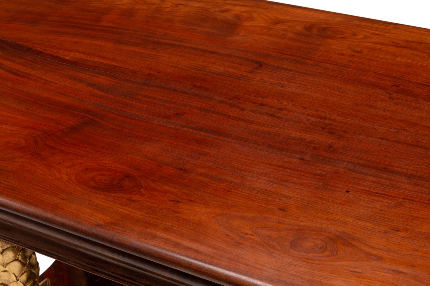 A North European Neoclassical Parcel Gilt Mahogany Center Table
