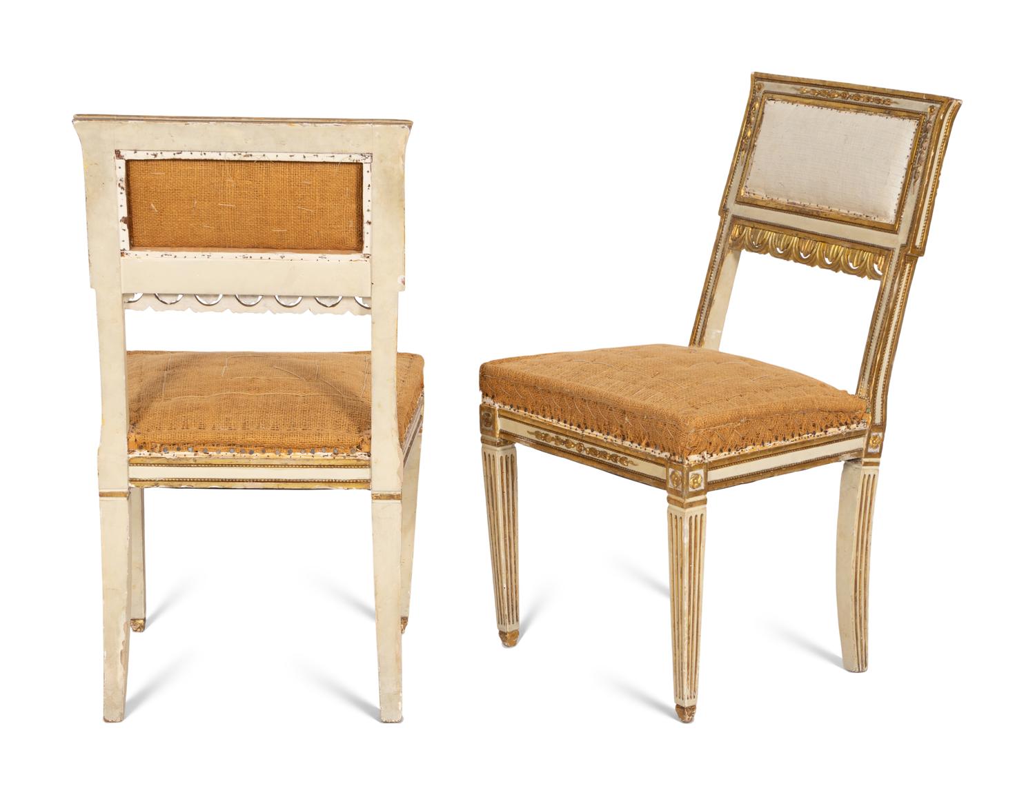 An Italian Louis XVI Style Cream Painted and Parcel Gilt Parlor Suite