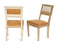 An Italian Louis XVI Style Cream Painted and Parcel Gilt Parlor Suite