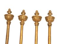 Four Italian Painted and Parcel Gilt Processional Poles