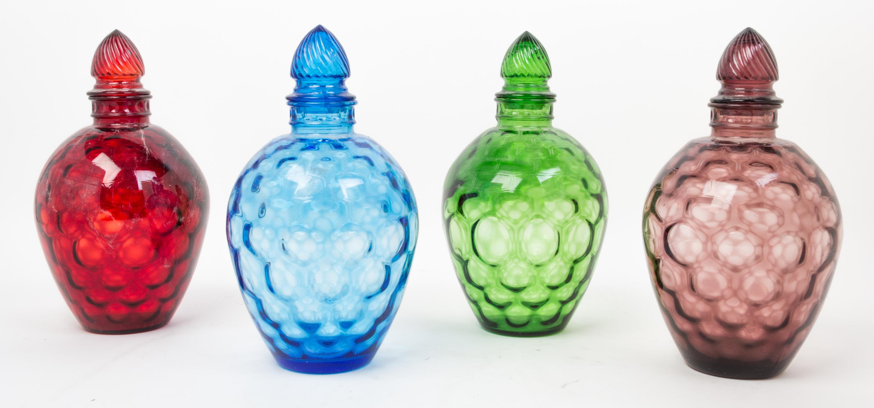 A Collection of Molded Glass Vessels Height 10 1/2 inches.
