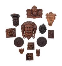 Thirteen Continental Carved Wood Masks