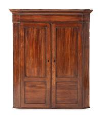 A Chippendale Figured and Paneled Mahogany Hanging Corner Cabinet