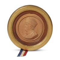 Jean Baptiste Nini (French, 1717-1786) Terra-cotta medallion profile of Benjamin Franklin