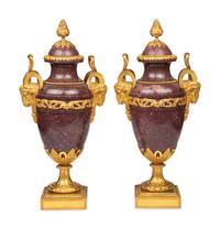 A Pair of Louis XVI Style Gilt Bronze Mounted Porphyry Urns