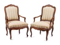 A Pair of Louis XV Walnut Fauteuils