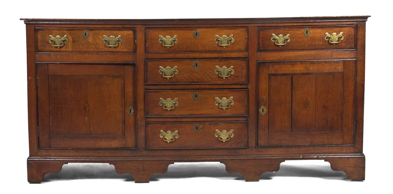 A Georgian Oak Server, Height 35 1/2 x width 74 x depth 18 1/2 inches.