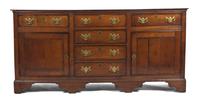 A Georgian Oak Server, Height 35 1/2 x width 74 x depth 18 1/2 inches.