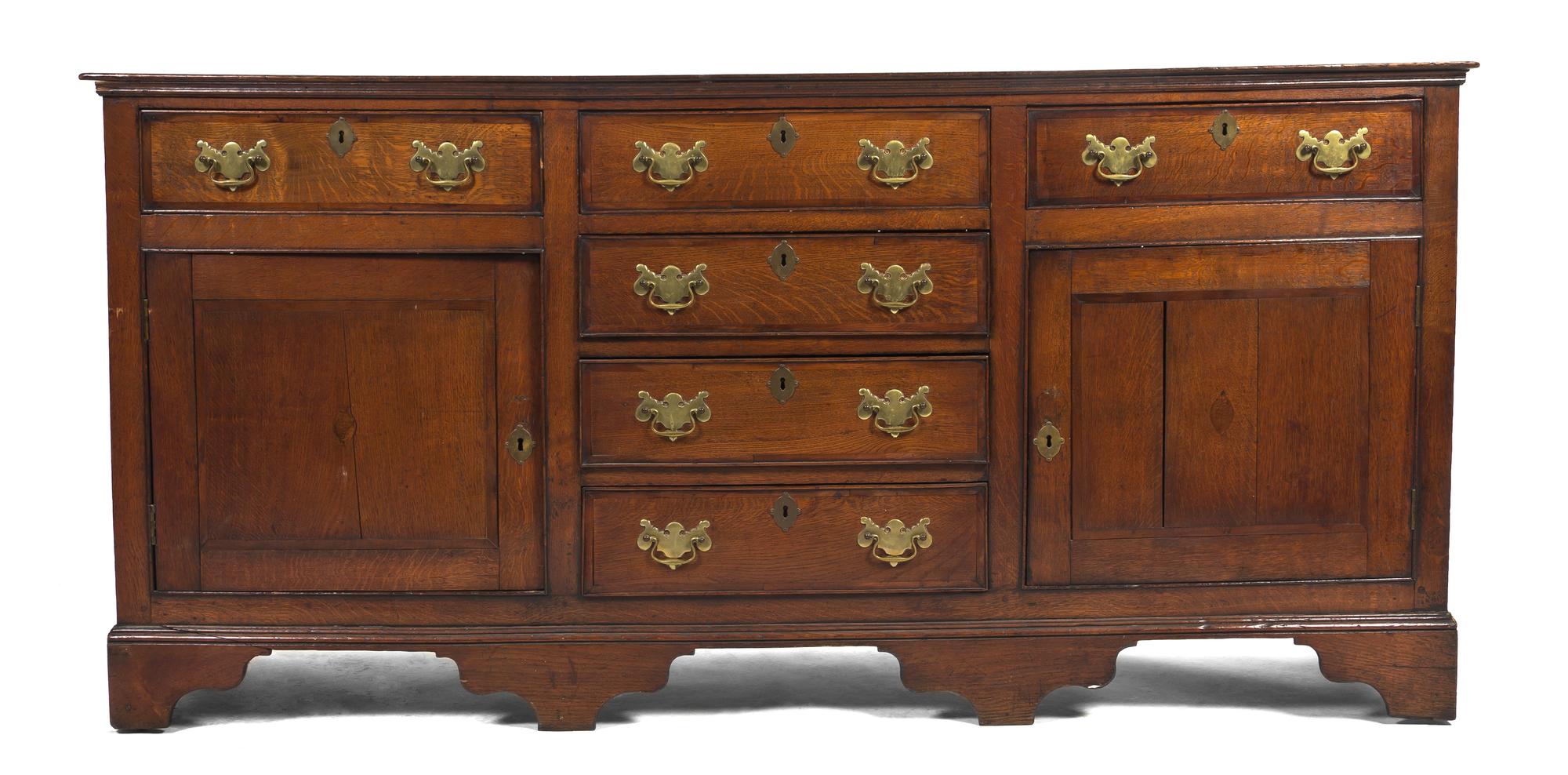 A Georgian Oak Server, Height 35 1/2 x width 74 x depth 18 1/2 inches.