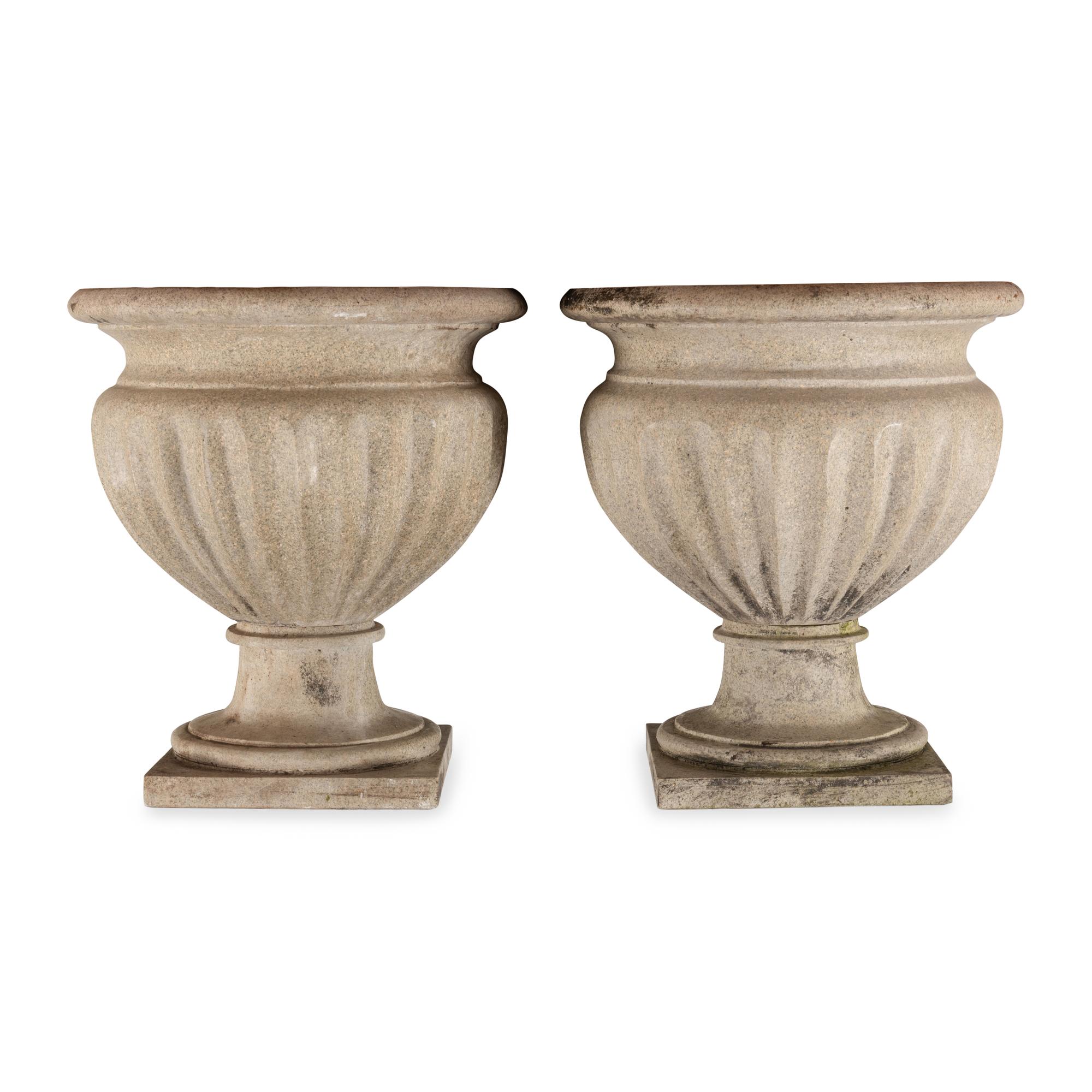 A Pair of Granite Garden Urns