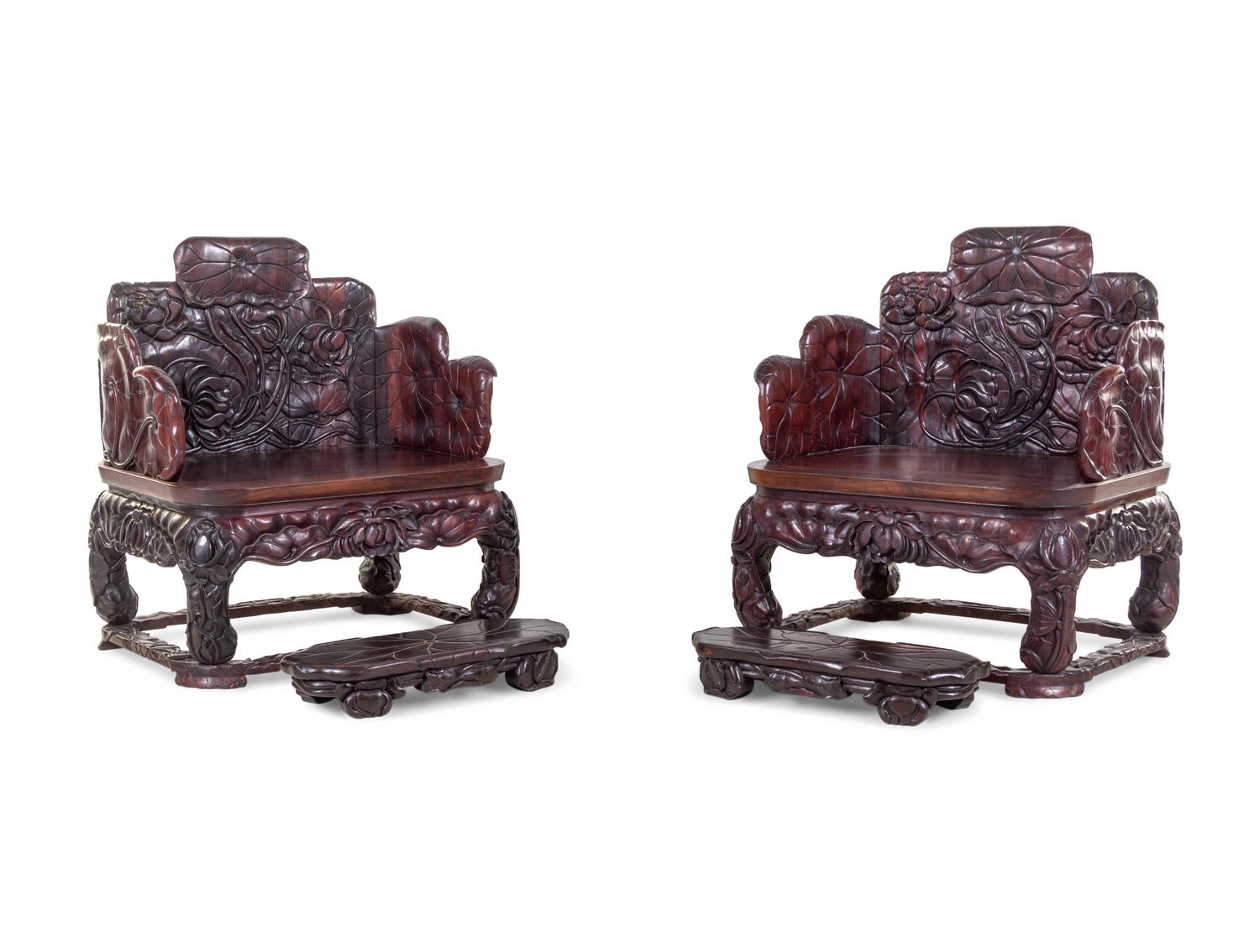 A Pair of Chinese Export Carved Hardwood Armchairs and Footrests