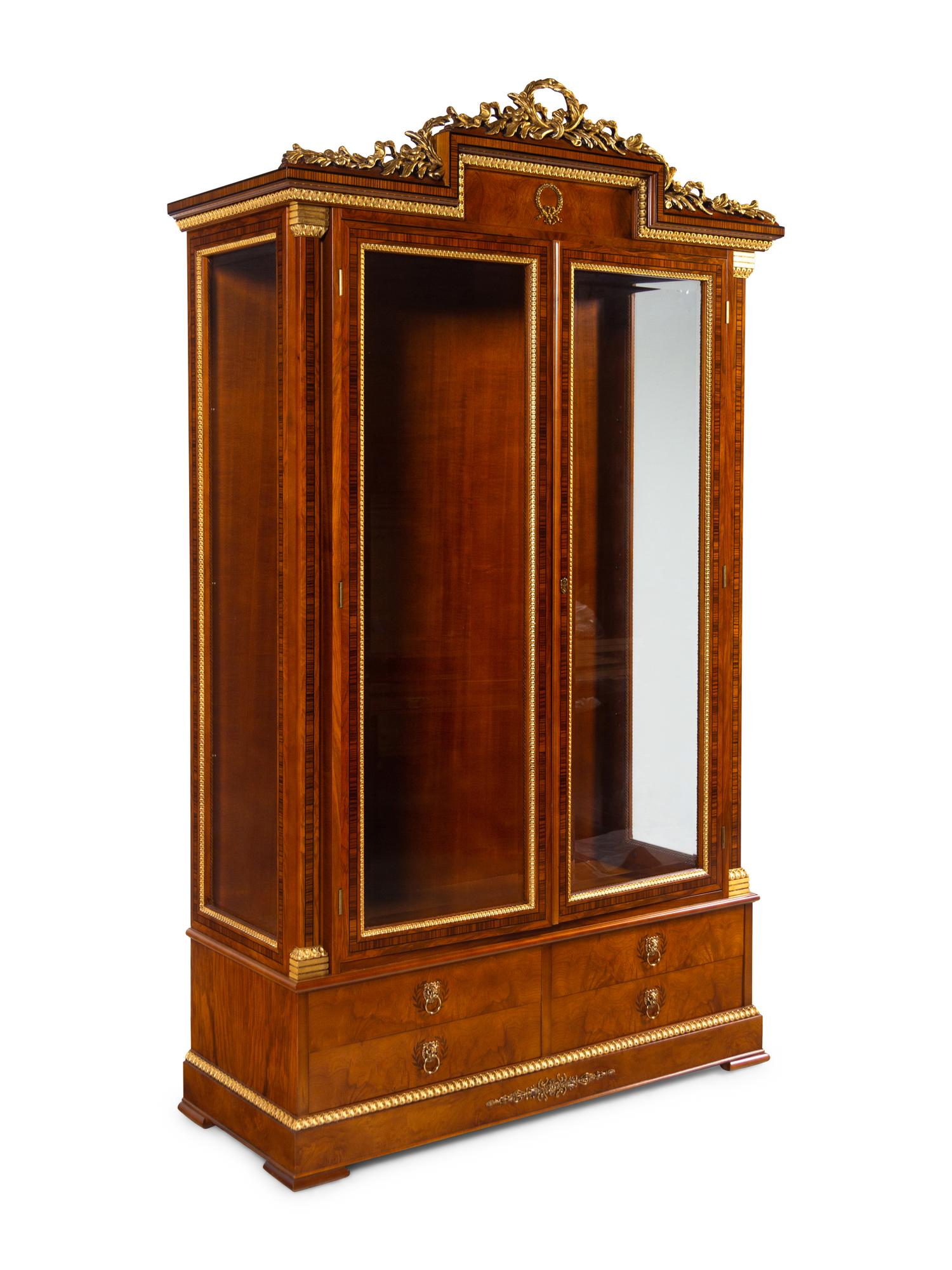 An Empire Style Gilt Metal Mounted Vitrine Cabinet