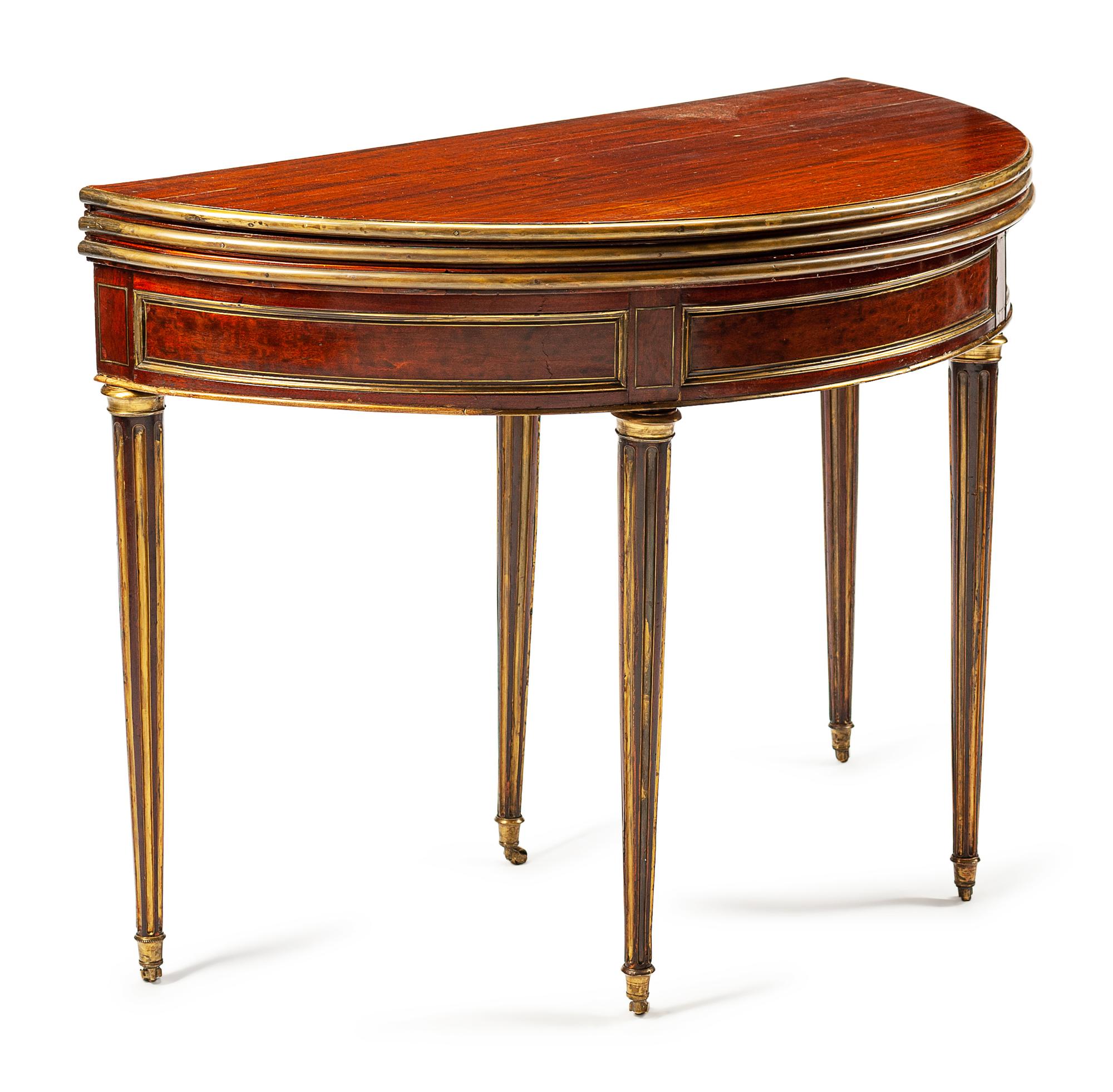 A Louis XVI Style Brass-Mounted Mahogany Triple-Top Demilune Games Table