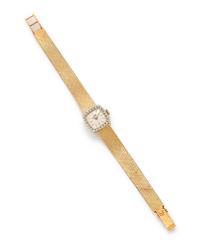 UNIVERSAL, 14K YELLOW GOLD AND DIAMOND WRISTWATCH