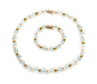 A 14 Karat Yellow Gold, Aquamarine and Cultured Pearl Bead Demi Parure, 34.80 dwts.