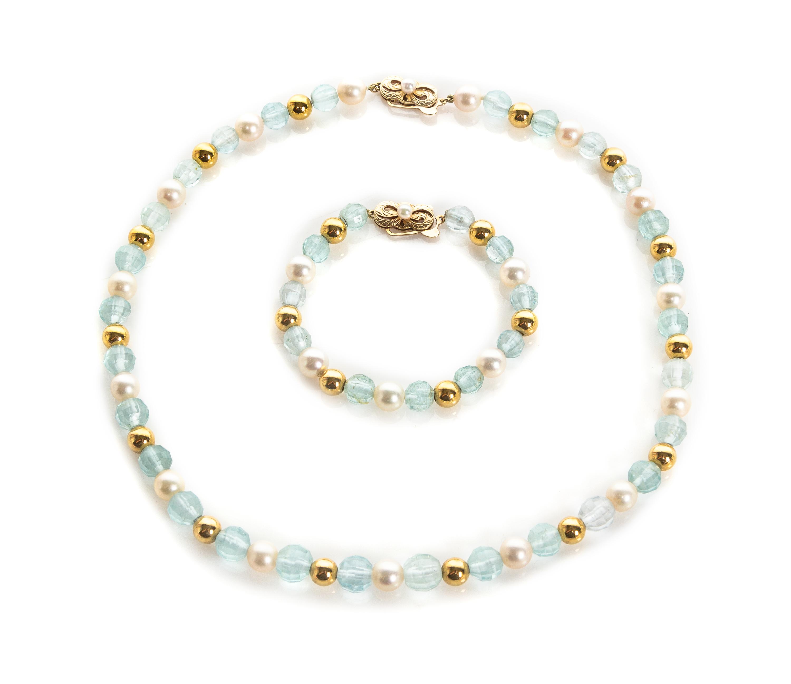 A 14 Karat Yellow Gold, Aquamarine and Cultured Pearl Bead Demi Parure, 34.80 dwts.