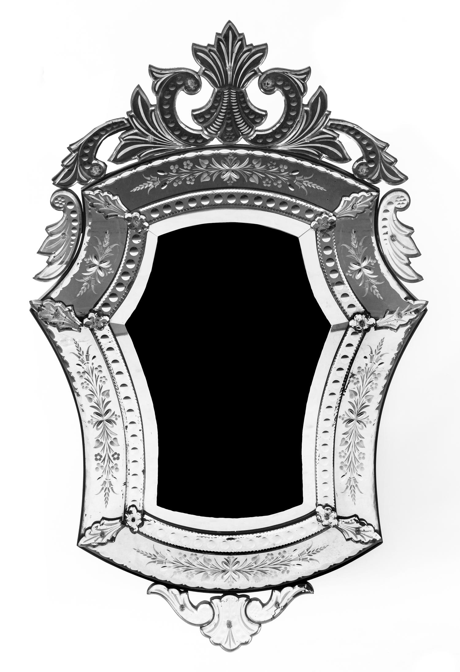 A Venetian Cut and Etched Glass Mirror, Height 46 3/4 x width 29 3/4 inches.