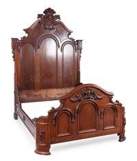 A Victorian Burlwood and Mahogany Bed Height of headboard 96 inches.