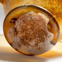 A Roman Yellow Glass Skyphos
