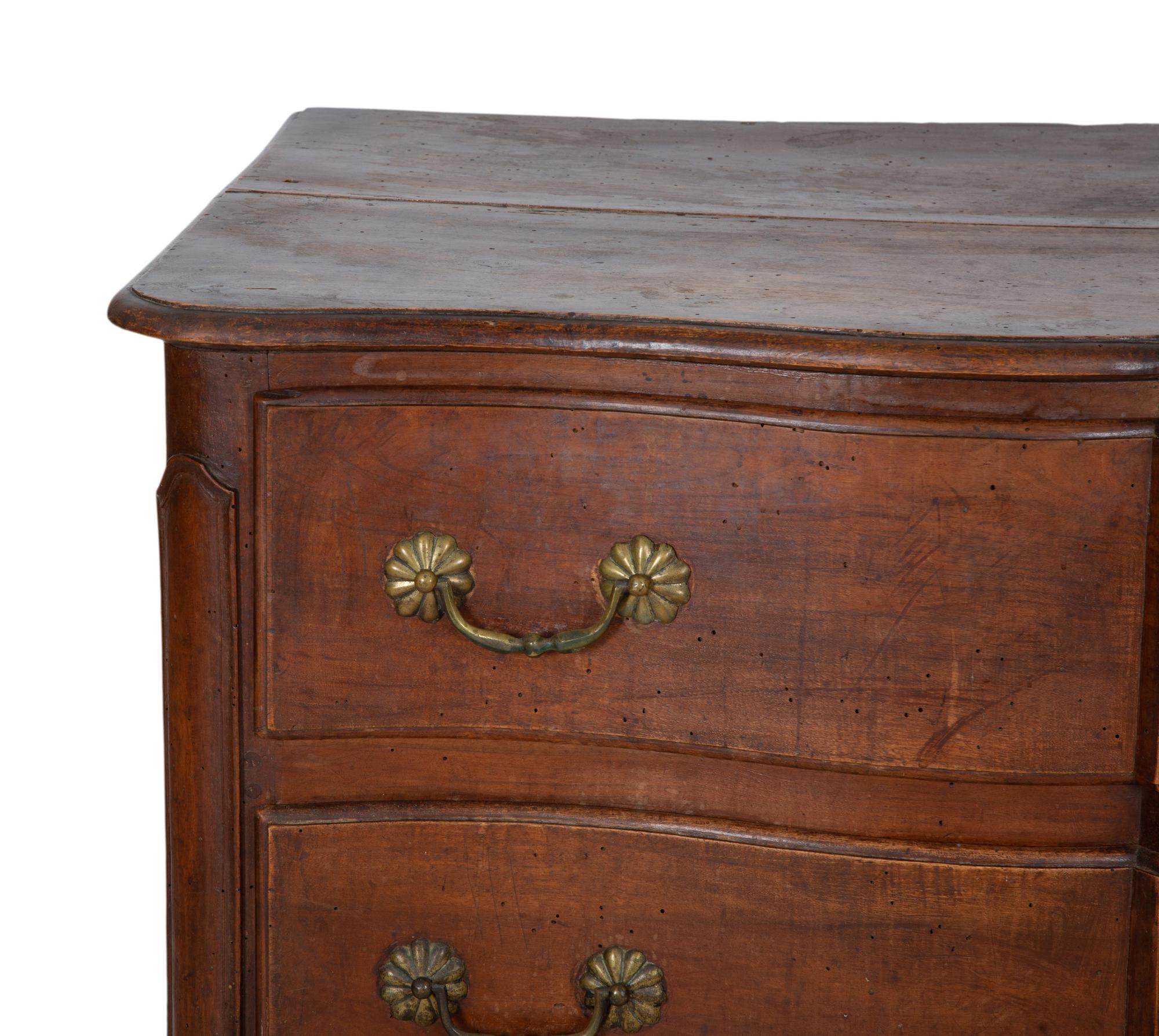 A French Provincial Carved Walnut Commode