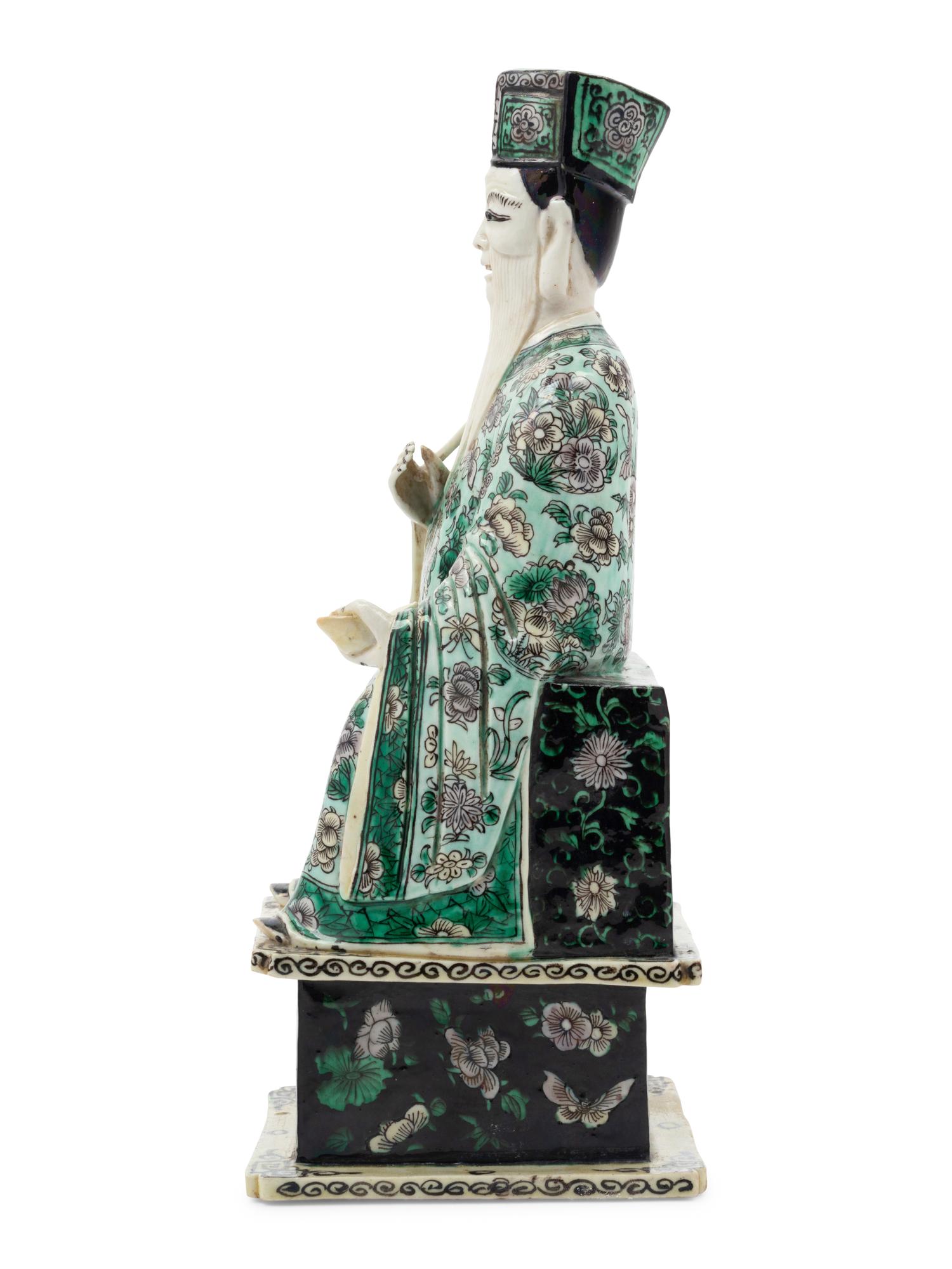A Chinese Famille Verte Porcelain Figure of an Immortal