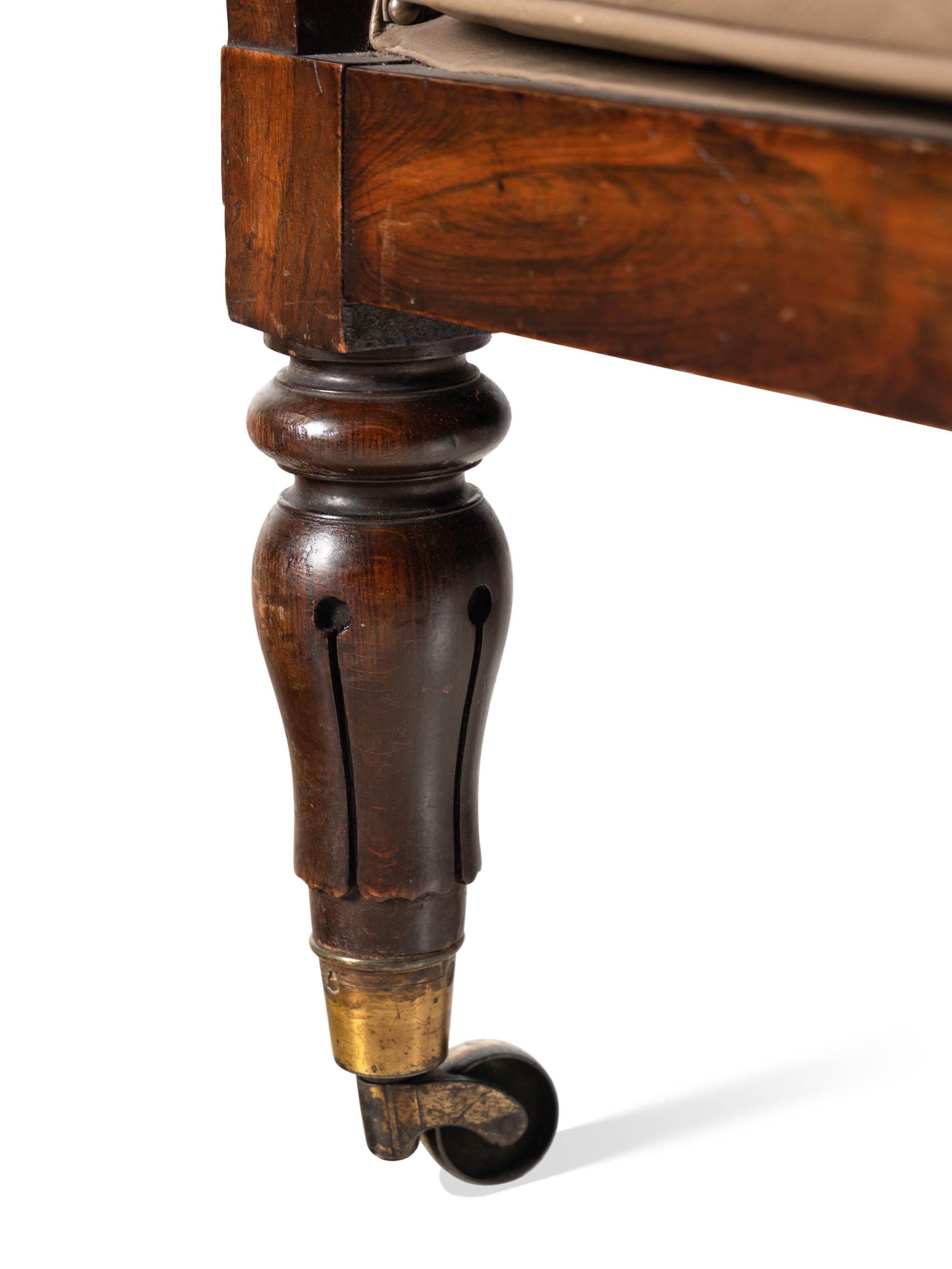 A Regency Style Leather-Upholstered Library Armchair