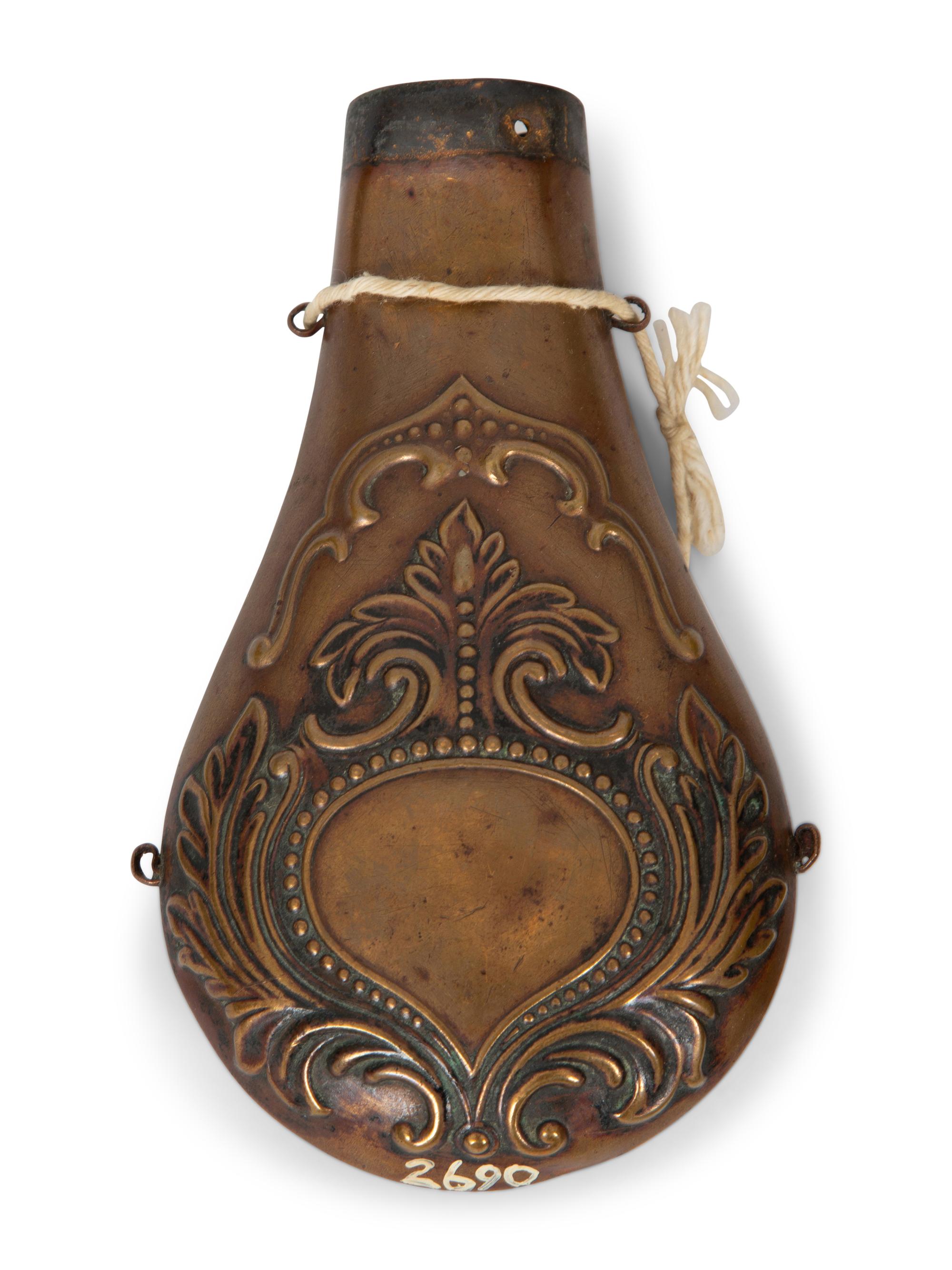 A Chinese Brass Silk Iron, Two Gunpowder Flasks and a Horn Vessel